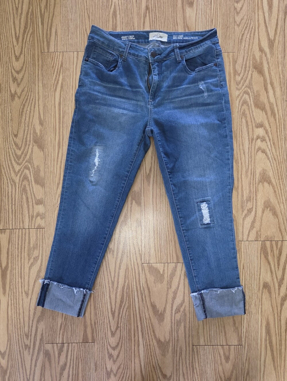 Distressed Cropped Blue Jeans with Rolled Hem - Women's
